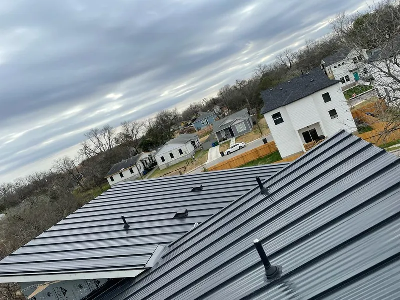 Standing seam metal roof panels with vents for Skylight Repair in Ketchikan